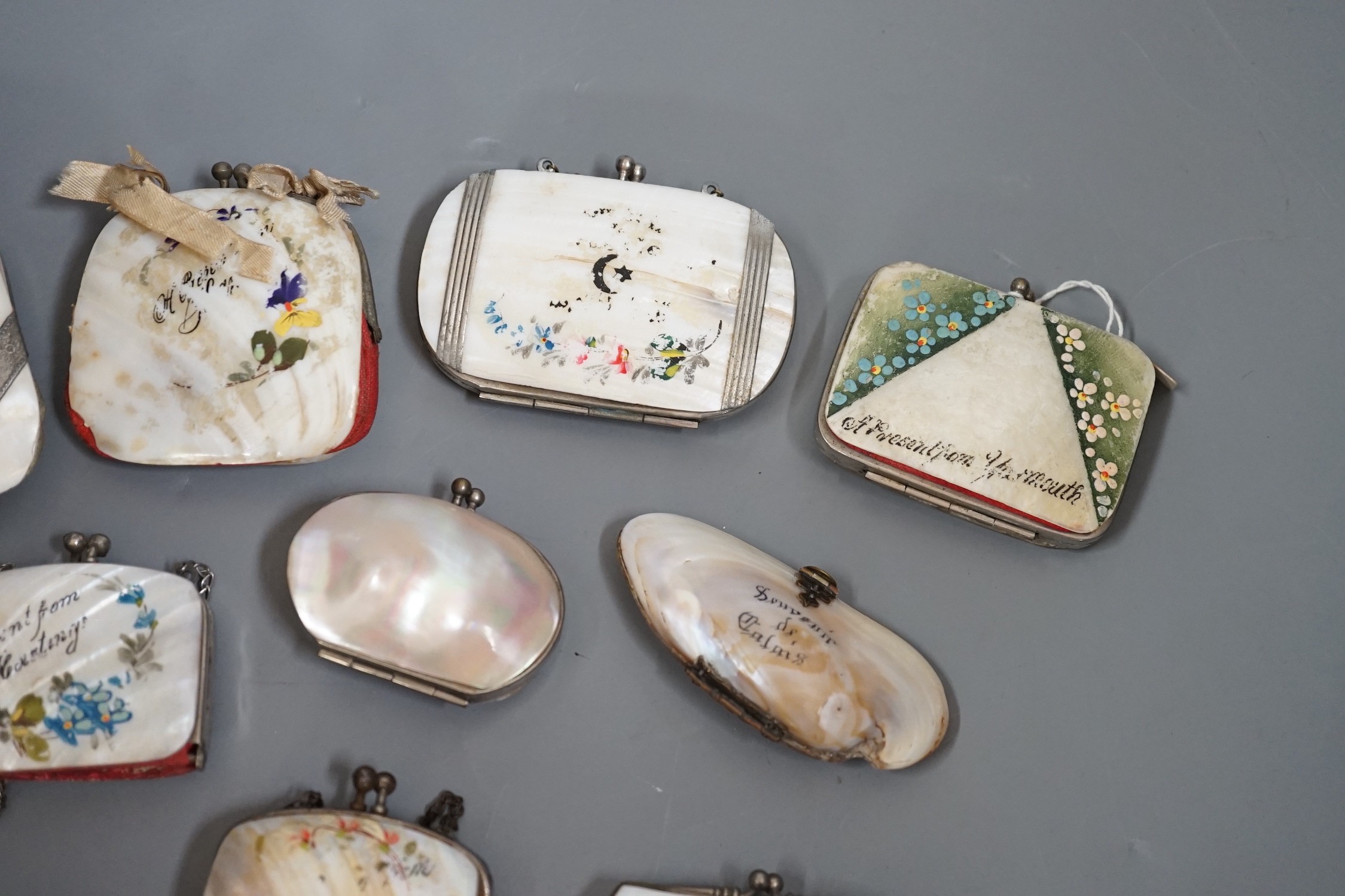 Nine 19th century souvenir mother of pearl purses, and three others